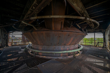 Abandoned Heavy Industrial Ruins with Large Blast Furnace in Steelworks