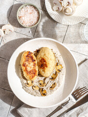 cutlets with mushroom puree and champignons