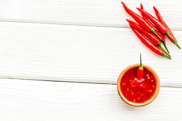hot chilli pepper pattern on white wooden background top view mock up