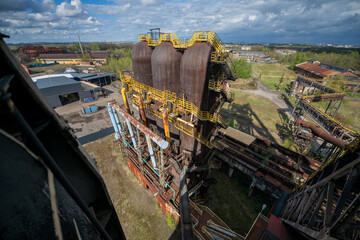 Abandoned Heavy Industrial Ruins with Large Blast Furnace in Steelworks
