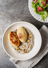 cutlets with mushroom puree and champignons