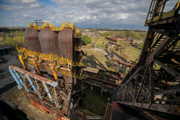 Abandoned Heavy Industrial Ruins with Large Blast Furnace in Steelworks