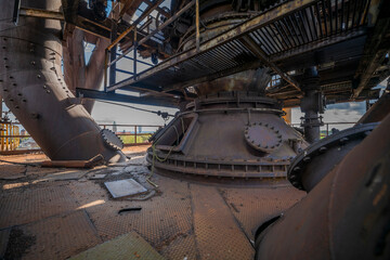 Abandoned Heavy Industrial Ruins with Large Blast Furnace in Steelworks