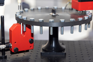 Turning Bolts at Carousel in Metal Factory Production