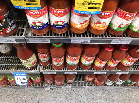 South Australia, Australia &ndash; Circa August, 2025: Rows of jars of pasta sauce displayed on shelves of supermarket