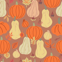 Seamless pattern with pumpkins, squash, garlic and autumn leaves. Fall harvest and seasonal vegetable concept.