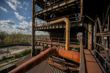 Abandoned Heavy Industrial Ruins with Large Blast Furnace in Steelworks
