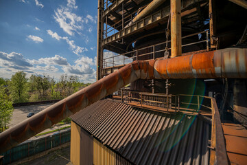 Abandoned Heavy Industrial Ruins with Large Blast Furnace in Steelworks
