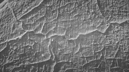 Concrete texture with stains, scratches, and cracks. Rugged wall surface perfect for architectural...