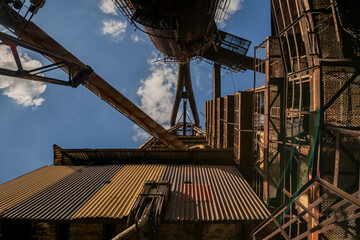 Abandoned Heavy Industrial Ruins with Large Blast Furnace in Steelworks