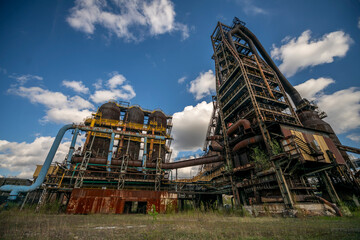 Abandoned Heavy Industrial Ruins with Large Blast Furnace in Steelworks