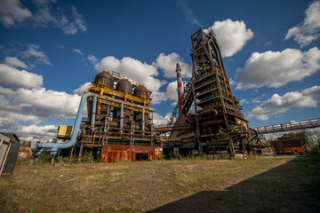 Abandoned Heavy Industrial Ruins with Large Blast Furnace in Steelworks