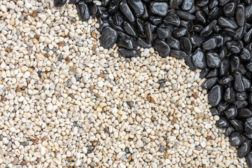 Close up black stones and white gravel texture background for wallpaper.