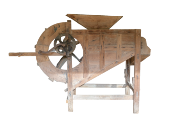 Antique rice mill made of wood in Thailand on white background