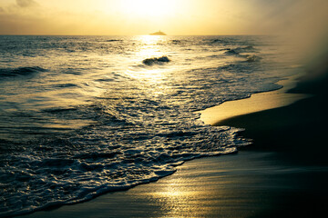 Serene Golden Sunset Over Ocean Waves