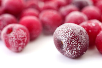 Macro shot of frozen cherries with ice crystals