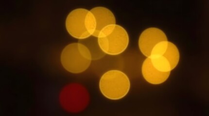 Soft golden bokeh lights on a dark background