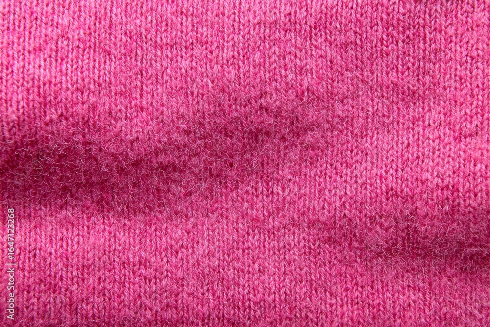 Poster soft pink wool fabric with visible knitting creating a warm and comfortable texture