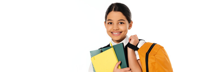 Excitement for learning shines in schoolgirl ready for a new school year adventure