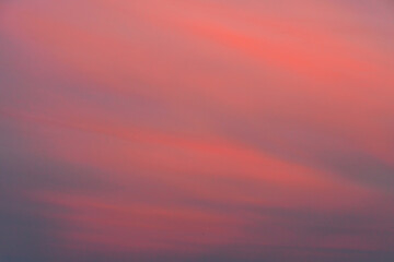 Bright sky at sunset, clouds, warm colors