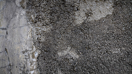 Worn-out wall texture with visible decay, cracks, and stains on old concrete. Useful for grunge art...