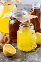Colorful Kombucha Jars and Bottles on wooden table