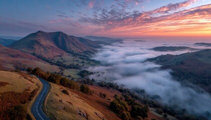 Misty mountain valley at dawn