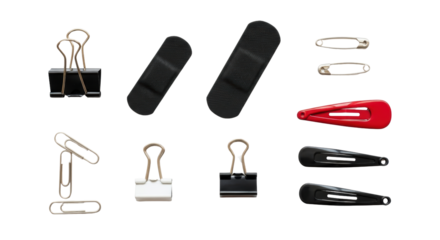 Assorted office and hair accessories isolated on transparent background, binder clips, paper clips, safety pins, adhesive bandages, and snap hair clips
