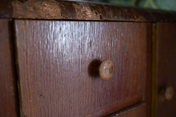 Beautiful antique wooden chest of drawers. Details of antique wooden furniture. Soviet furniture....