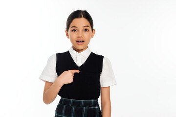 Excited preteen schoolgirl expresses joy in a studio setting for back to school moments
