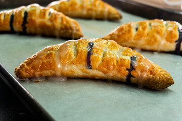 Blueberry and Apricot Jam Triangles Pie. Puff Pastry. Dessert