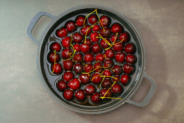 Juicy seasonal black cherries close-up
