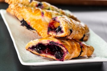 Blueberry and Apricot Jam Triangles Pie. Puff Pastry. Dessert