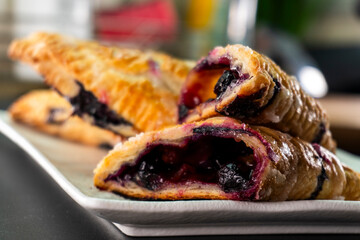 Blueberry and Apricot Jam Triangles Pie. Puff Pastry. Dessert