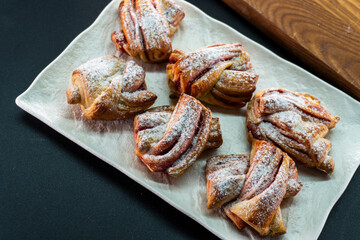 braid with jam and puff pastry. Puff pastry. Dessert