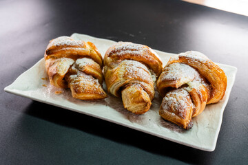 Croissant with caramel. Puff pastry. Dessert
