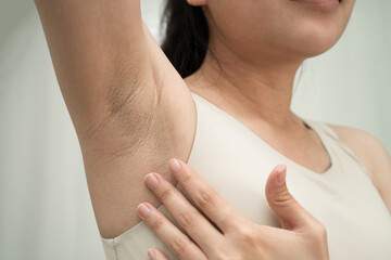 Asian woman have problem black armpit beauty skin care.
