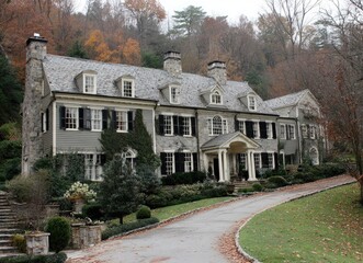 Fototapeta premium Large stone house with a long driveway