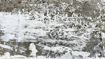 Heavily aged concrete wall texture with grime, crack patterns, and discoloration. Great for restoration content or overlays.