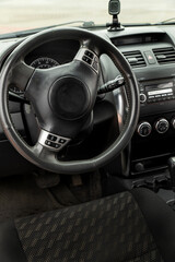 Car interior with black textile seats close-up