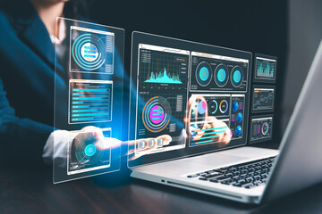 Woman in business uses computers and internet technology to perform SEO analysis, optimizing...