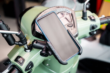 Smartphone device gadget mounted on phone holder on motorcycle handlebar, To safely mount a phone...
