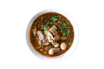 Thai boat noodle soup with pork and herbs
