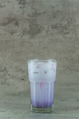 Iced Taro Milk Tea in a Glass with Tapioca Pearls
