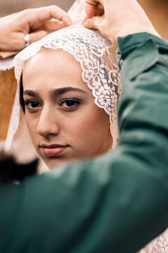 Preparation of traditional fallera attire in valencia