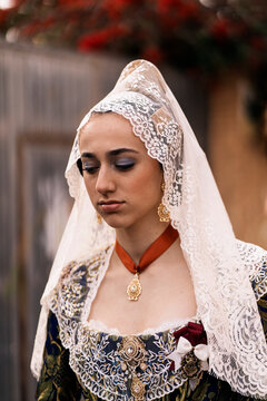 Traditional Valencian Fallera in Intricate Lace Attire