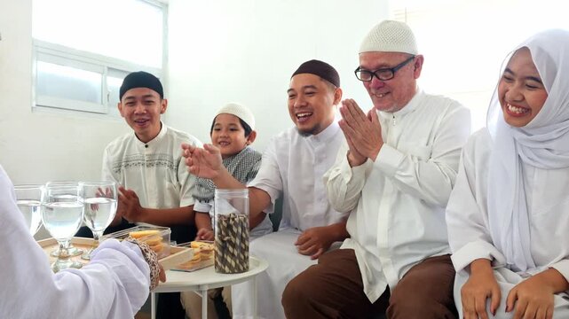 Mother Served a Tray of Drinks For His Family To Enjoying Snack And Drinks During Happy Eid