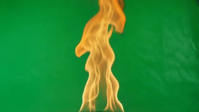 Vibrant Orange Flame Burning Against Green Screen Background Dynamic Fire Element for Visual