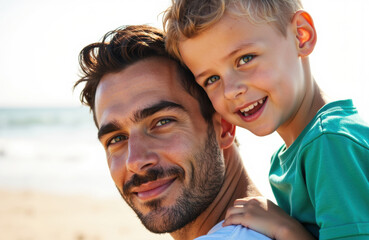Fototapeta premium A man and a young boy smile happily together outdoors on a sunny day