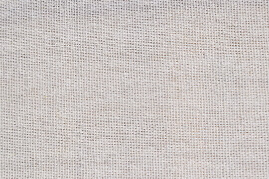Fundo de Tecido de algod&atilde;o cinza creme. Textura de pano acinzentado.